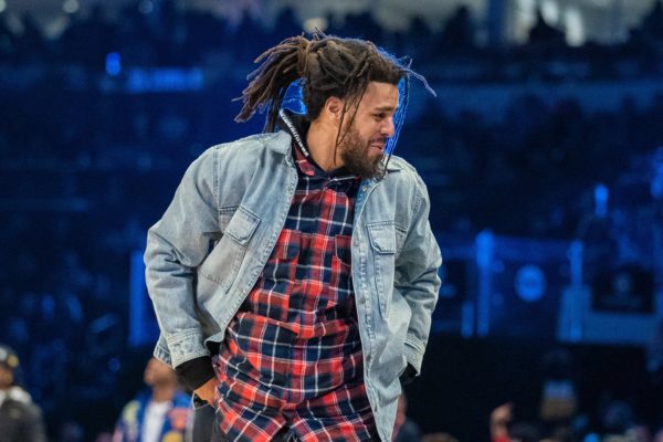 J. Cole hooping in Africa is all about headlines
