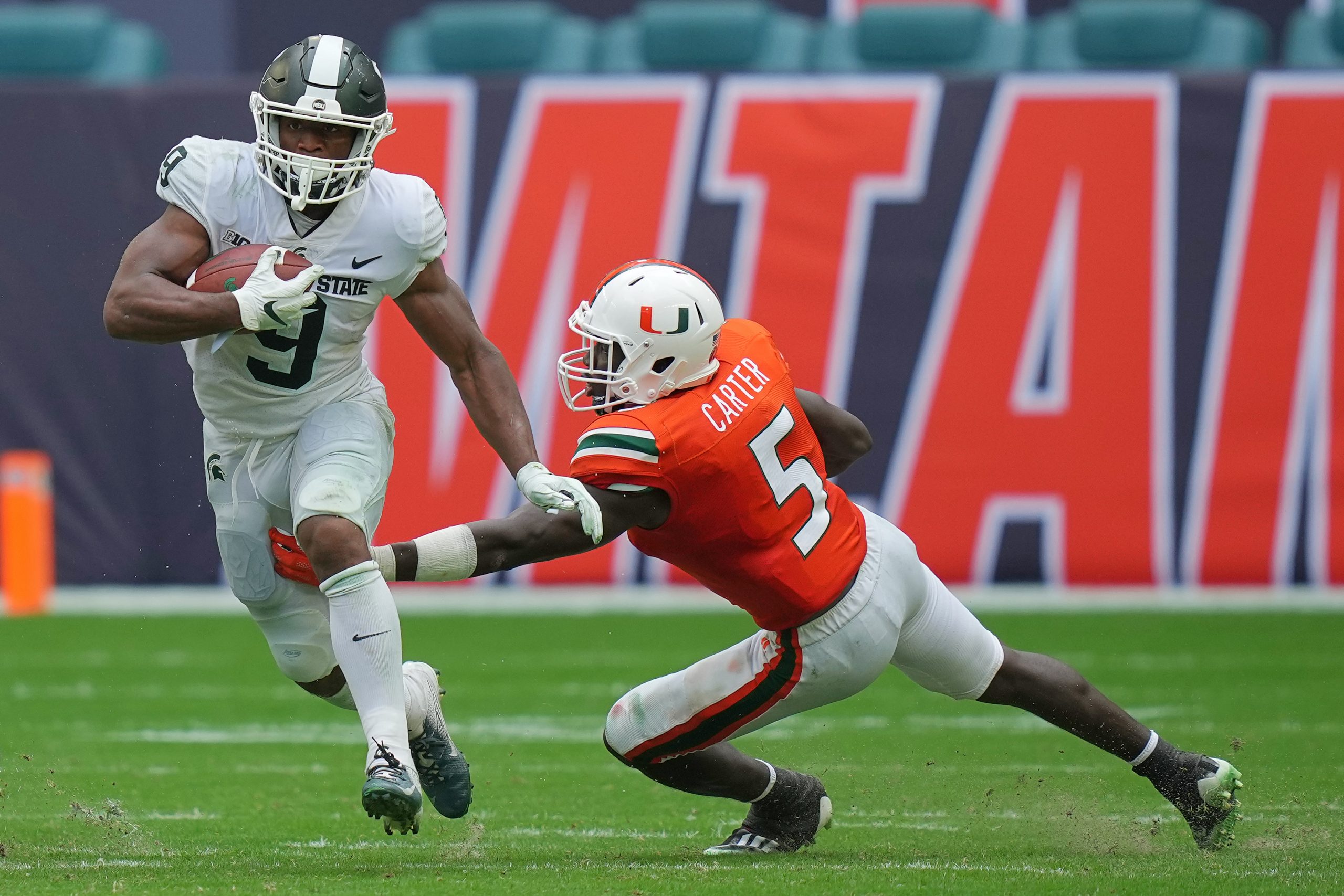 Michigan State Football beats Miami because of Kenneth Walker lll running for over 100 yards.