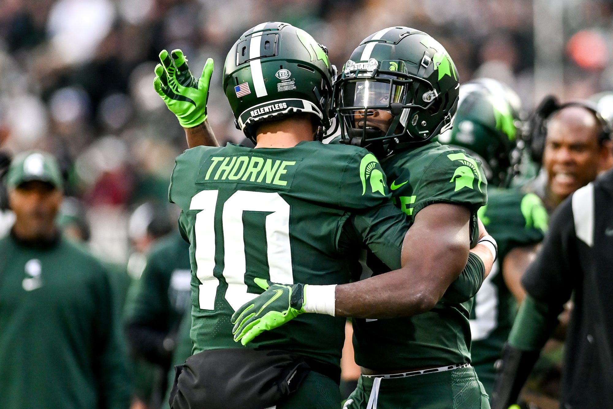 Spartans quarterback Payton Thorne and Wide Receiver Jayden Reed celebrate a touchdown in a win over the Maryland football team