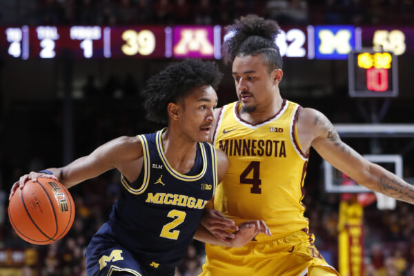 Michigan eases by Minnesota