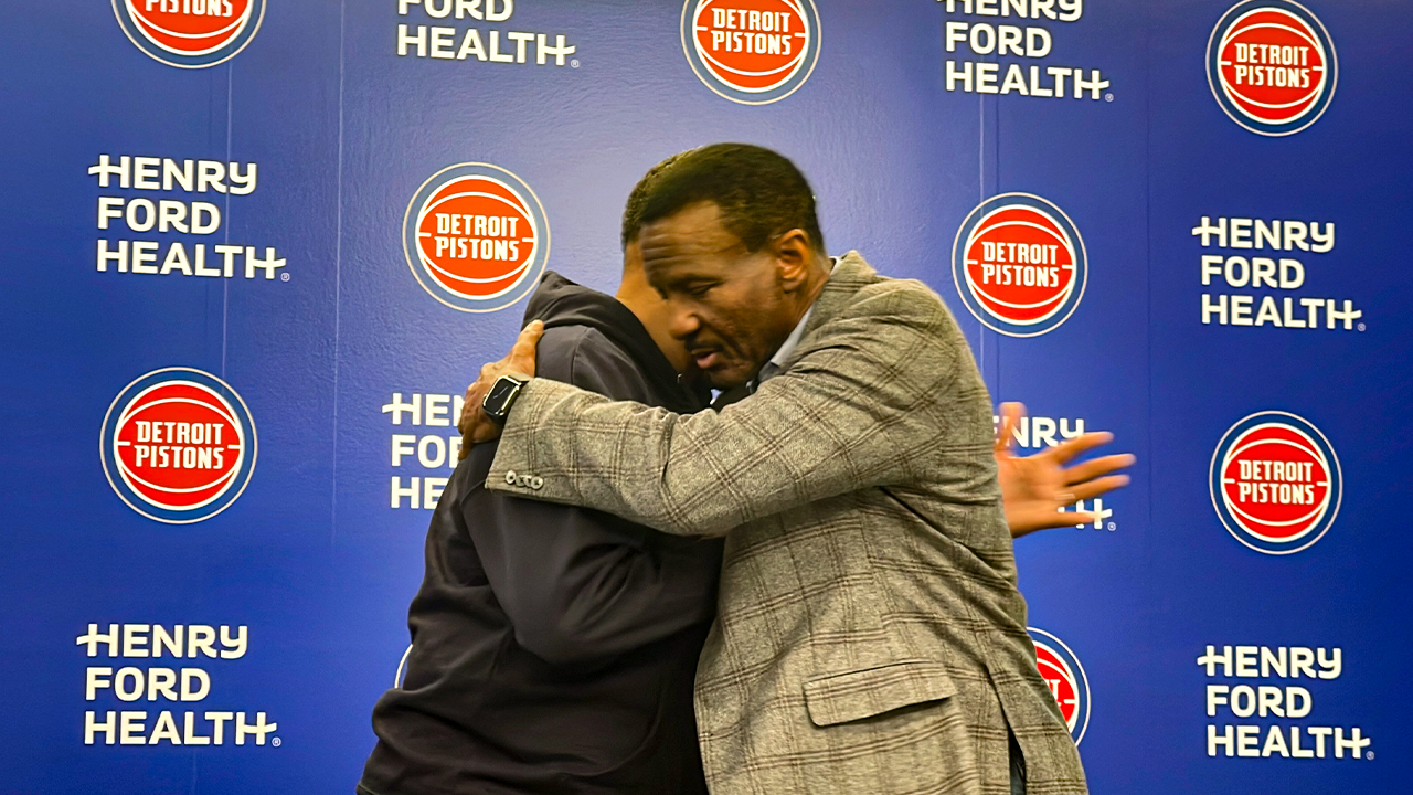 Troy Weaver and Dwane Casey hug at the Detroit Pistons exit interview media sessions at the Detroit Pistons Performance Center. Mandatory Photo Credit: Brandon Dent Woodward Sports Network Pistons Beat Reporter