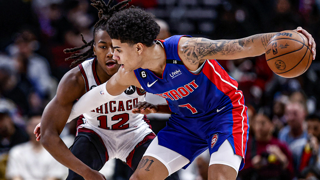 Apr 9, 2023; Chicago, Illinois, USA; Chicago Bulls guard Ayo Dosunmu (12) defends against Detroit Pistons guard Killian Hayes (7) during the first half at United Center. Mandatory Credit: Kamil Krzaczynski-USA TODAY Sports