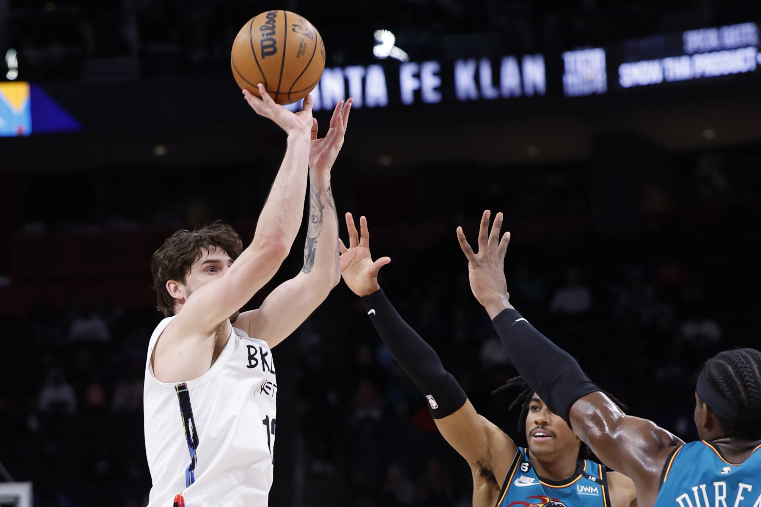 Apr 5, 2023; Detroit, Michigan, USA; Brooklyn Nets forward Joe Harris (12) shoots in the first half against the Detroit Pistons at Little Caesars Arena. Mandatory Credit: Rick Osentoski-USA TODAY Sports. Article by Brandon Dent
