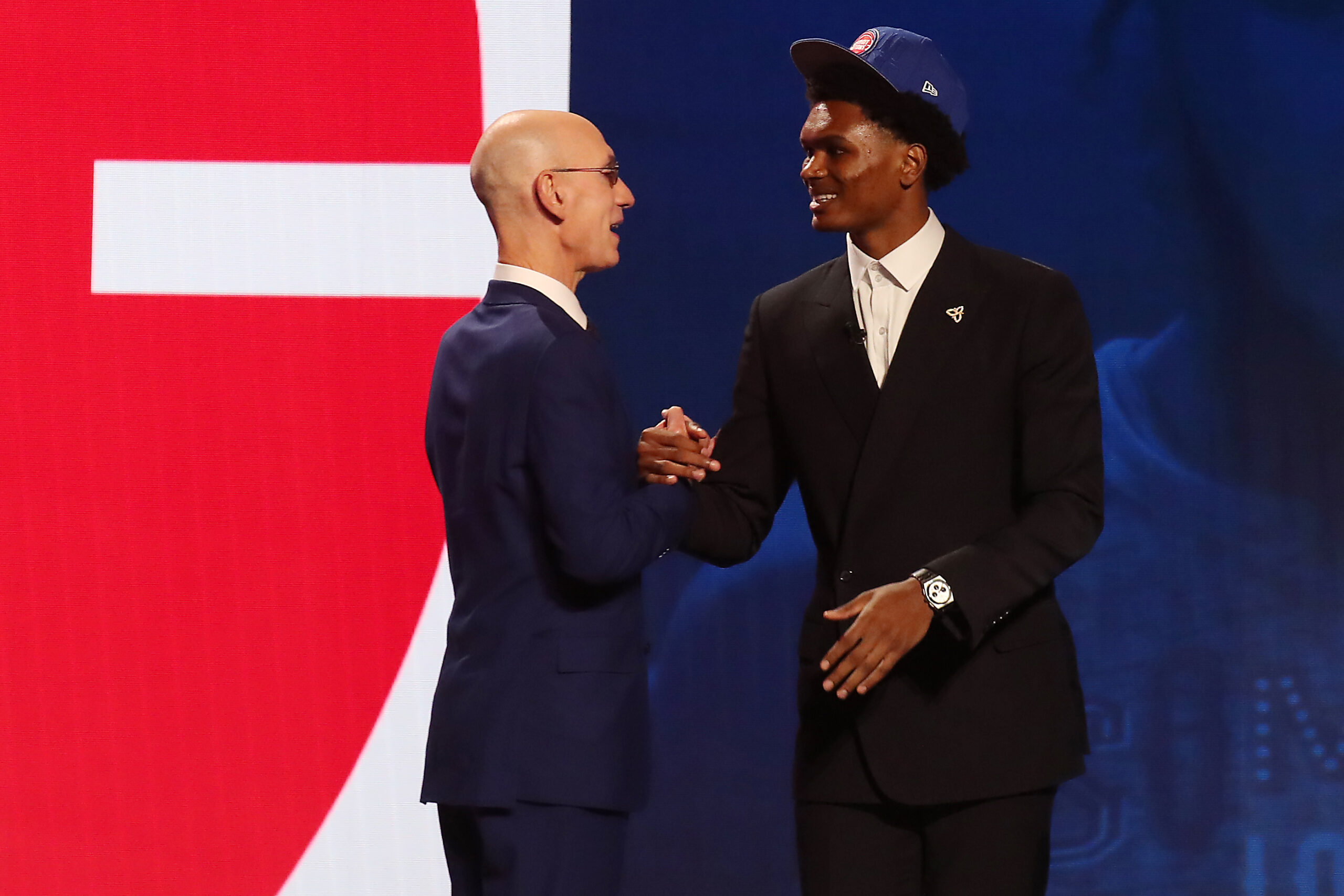 Jun 22, 2023; Brooklyn, NY, USA; Ausar Thompson is greeted by NBA commissioner Adam Silver after being selected fifth by the Detroit Pistons in the first round of the 2023 NBA Draft at Barclays Arena. Mandatory Credit: Wendell Cruz-USA TODAY Sports. Article by Brandon Dent